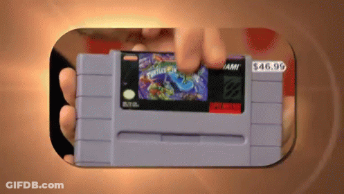 Person Holding Super Nintendo Game For $49.99 GIF