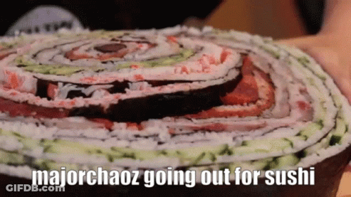 Person Holding Sushi Cake Saying Majorchaos Going Out For Sushi GIF