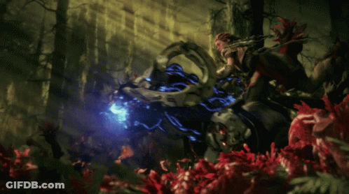 Person Holding Sword In Dark Forest GIF
