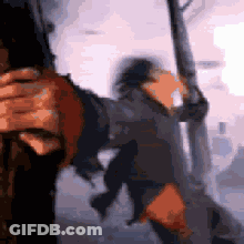 Person Holding Sword GIF