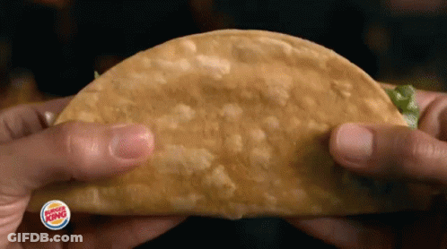 Person Holding Taco GIF