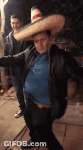 Person Holding Taco Over Sauce GIF