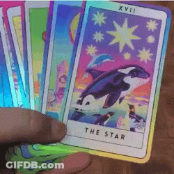 Person Holding Tarot Deck With Star Card GIF