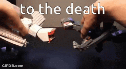 Person Holding Toy Saying To The Death GIF