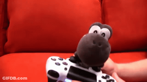 Person Holding Video Game Controller With Stuffed Animal GIF