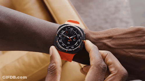 Person Holding Watch Showing 7:55 GIF