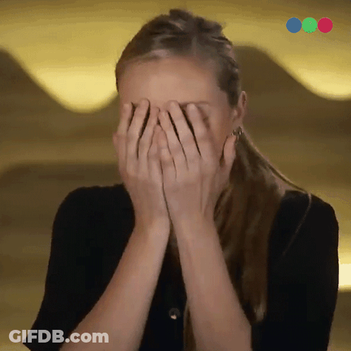Person Holding White Cat's Head GIF