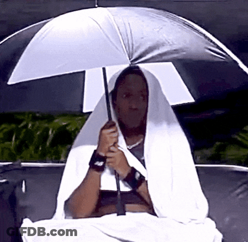 Person Holding White Umbrella With Letter A GIF