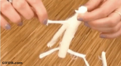 Person Holding White Yarn On Table GIF