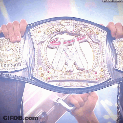 Person Holding Wrestling Belt Saying The Big GIF