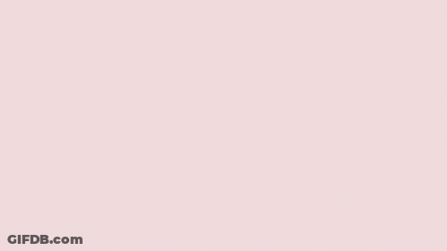 Person Holding Yellow Flower In Yellow Field GIF