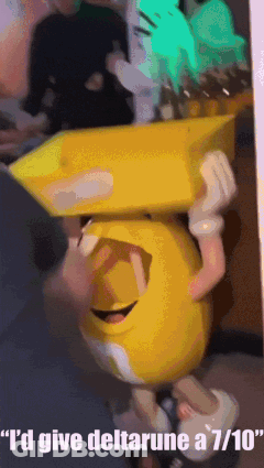 Person Holding Yellow Smiley Face Saying I'd Give Deltarune A 7/10 GIF