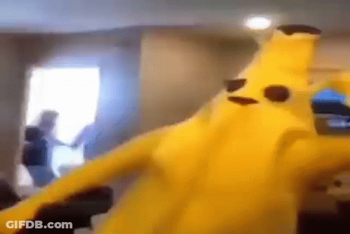 Person In Banana Costume Dancing With Woman GIF