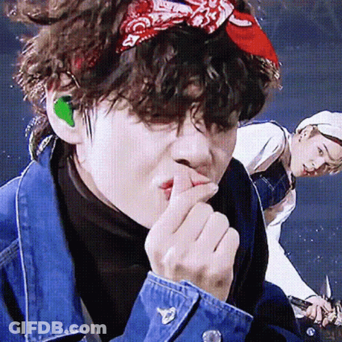 Person In Bandana And Denim Jacket GIF
