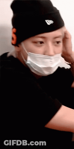 Person In Beanie With Mask Letter S GIF