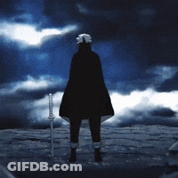 Person In Black Cape Holding Sword GIF