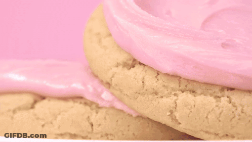 Person In Black Gloves Frosting Cookie GIF