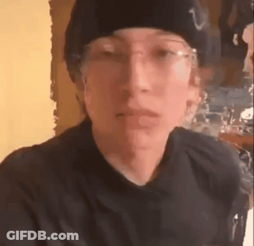 Person In Black Hat And Glasses GIF