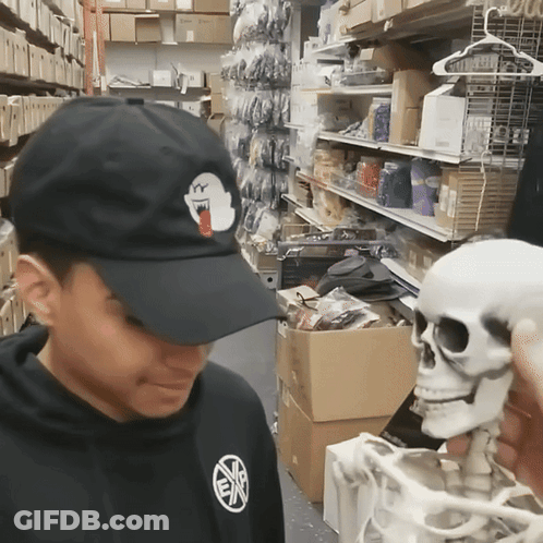 Person In Black Hat With Ghost GIF