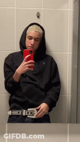 Person In Black Hoodie Taking Selfie GIF
