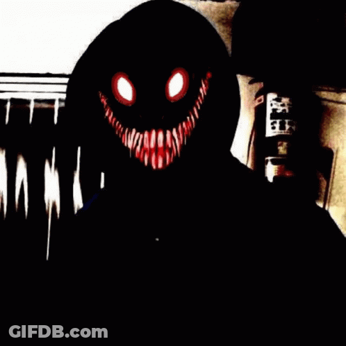 Person In Black Hoodie With Scary Face And Red Eyes GIF