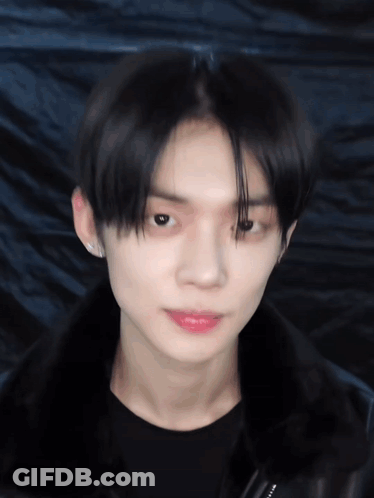 Person In Black Jacket Close Up GIF