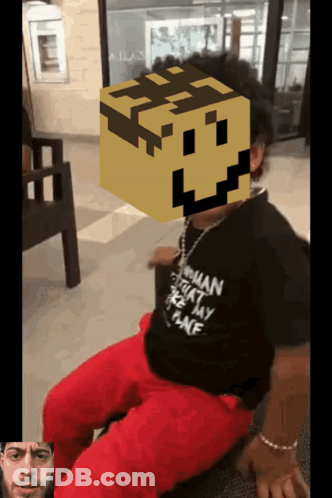 Person In Black Orphan Shirt Sitting GIF