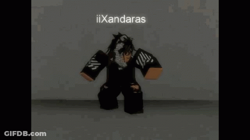 Person In Black Outfit Kneeling GIF