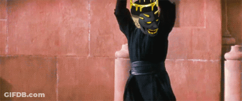 Person In Black Robe And Mask GIF