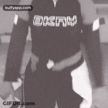 Person In Black Shirt With DKNY GIF