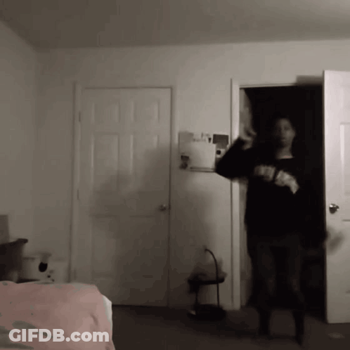 Person In Black Sweater Saying New York GIF