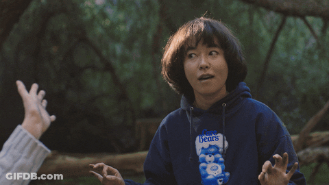 Person In Blue Care Bears Sweatshirt Giving High Five GIF