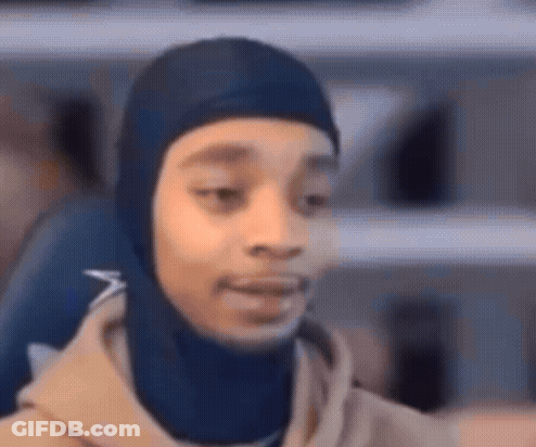 Person In Blue Hooded Hat Close Up GIF