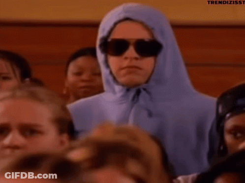Person In Blue Hoodie And Sunglasses Crowd GIF
