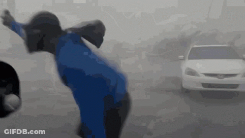 Person In Blue Jacket In Front Of White Honda GIF