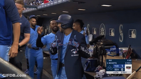 Person In Blue Jays Shirt In Dugout GIF