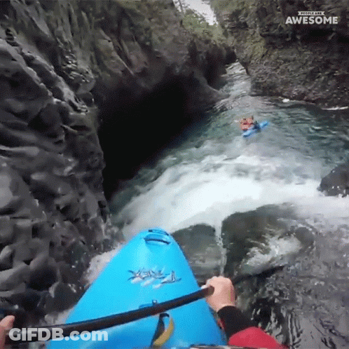 Person In Blue Kayak Going Down Waterfall Saying Awesome GIF