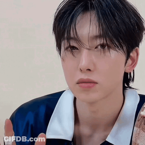 Person In Blue Shirt And White Collar GIF