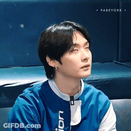 Person In Blue Shirt With Letter J GIF