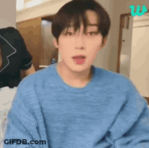 Person In Blue Sweater GIF