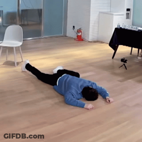 Person In Blue Sweater Lying Down GIF