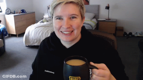 Person In Bubblesheep Hoodie Holding Coffee GIF