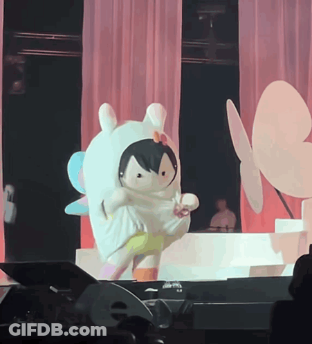 Person In Bunny Costume Dancing On Stage GIF