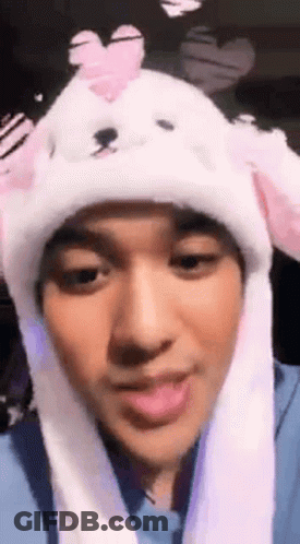 Person In Bunny Ear Hat With Heart GIF