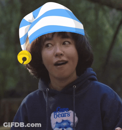 Person In Care Bears Sweatshirt And Striped Hat GIF