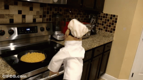 Person In Chef Hat Cooking Macaroni And Cheese GIF