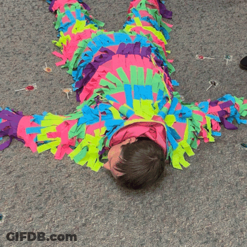 Person In Colorful Costume Lying On Back GIF
