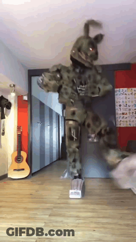 Person In Costume Dancing With Guitar GIF