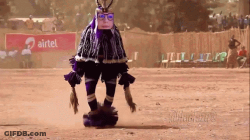 Person In Costume In Front Of Airtel Sign GIF
