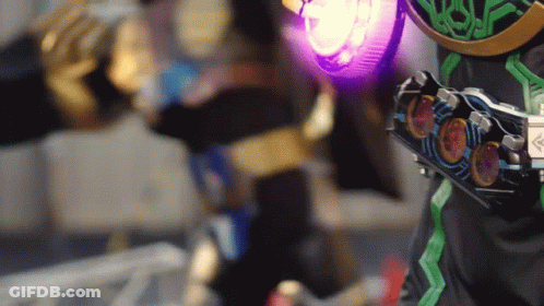 Person In Costume With Purple Light From Belt GIF